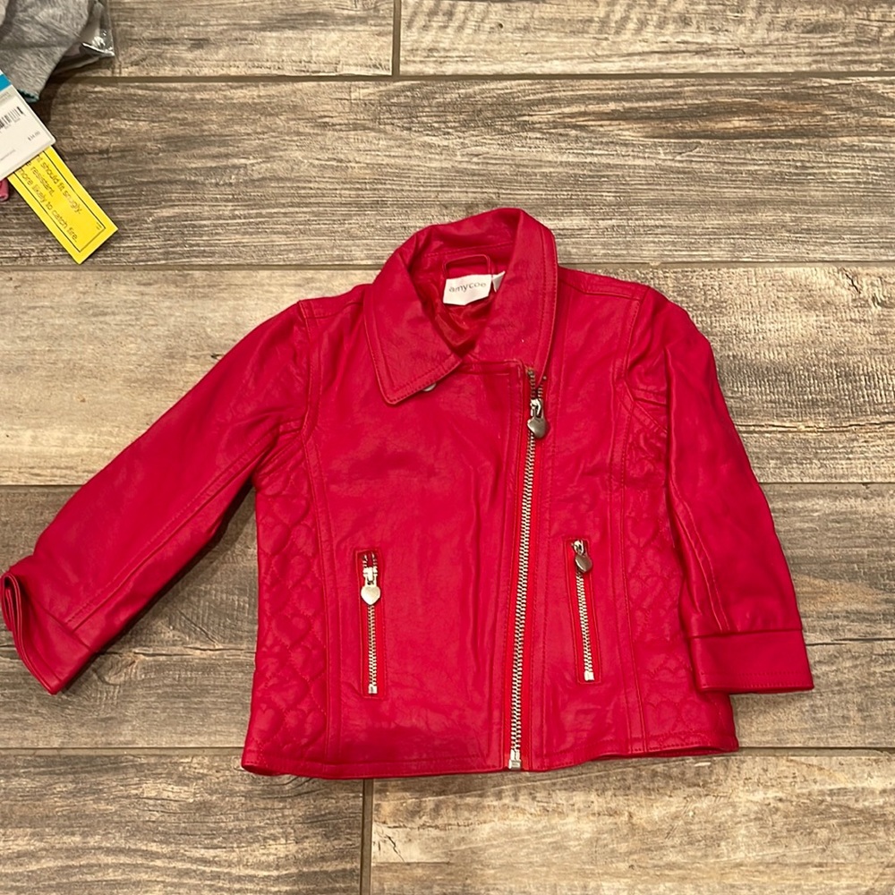 COPY - Red (non leather) but looks leather. Red heart details. 18m